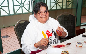 Mi'kmaq artist Sandra Simon creating a traditional quill basket during the Friends United Halifax Exhibition 2013 at Casino Nova Scotia in Halifax, Nova Scotia.