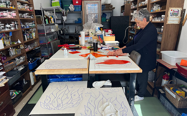 Melinda Robertson working in the Shannon Monk Studio at Friends United