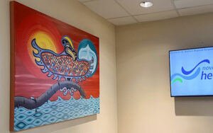 Indigenous artwork beside the welcome display at St. Martha’s Regional Hospital