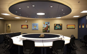 Indigenous artwork installed around the circular Wagmatcook Provincial Court courtroom